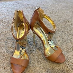 3.5 inch tan leather material stilettos w/gold metal